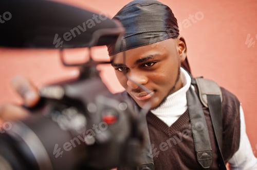 Preview: Young professional african american videographer