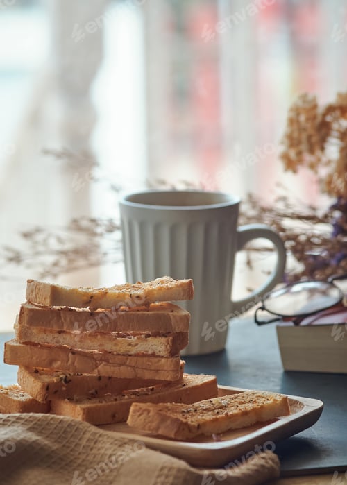 Preview: Garlic breadsticks in a wooden tray