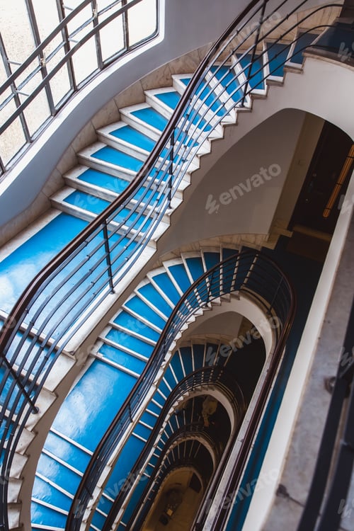 Preview: Old blue spiral staircase, spiral stairway inside an old house in Budapest, Hungary. Project