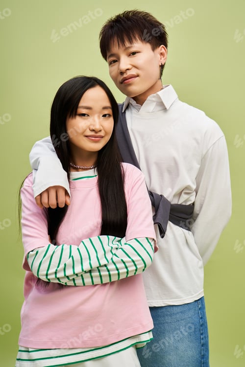 Preview: Stylish couple showcasing romance and fashion in a vibrant setting of artistic colors