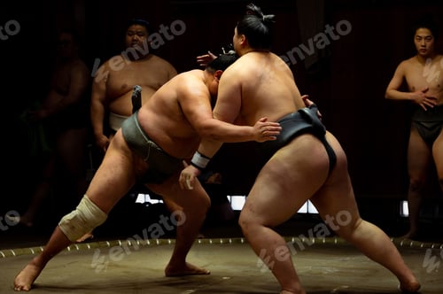 Preview: Shadows of Strength: Sumo Wrestlers Face Off in Low Key Training