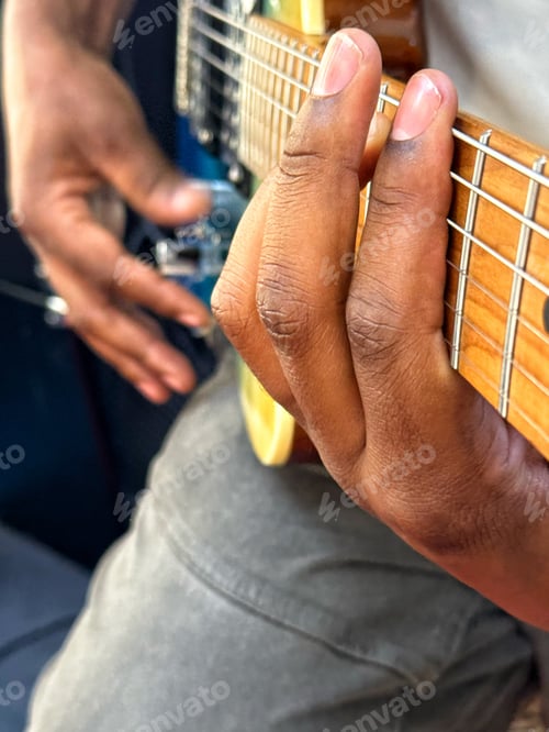 Preview: A young black diverse gen x unrecognizable guitarist musician plays guitar professionally in studio
