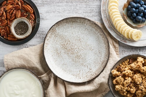 Preview: Yogurt with chocolate granola, bilberry. Breakfast, healthy diet food with oat flakes