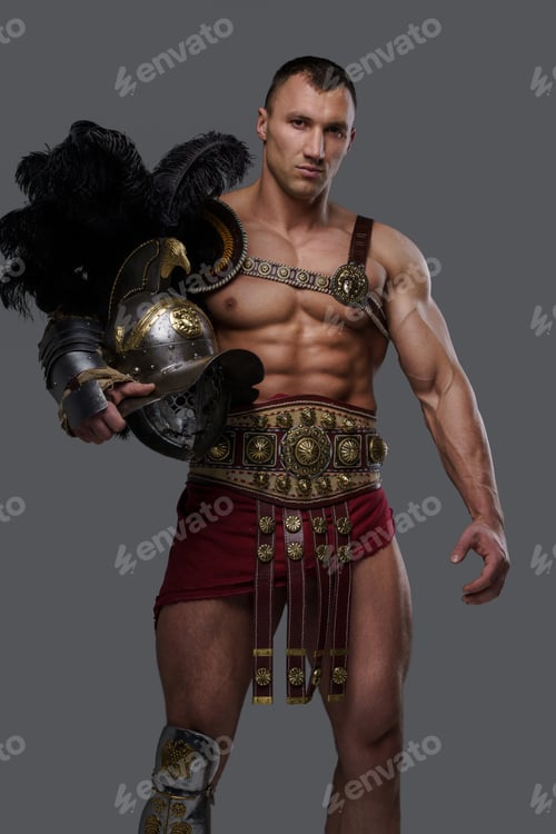 Preview: Gladiator with muscular build holding helmet against gray background