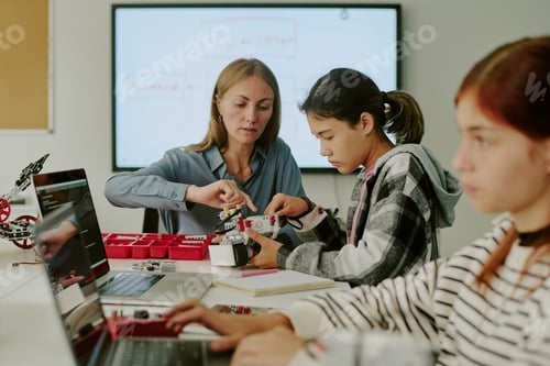 Preview: Teacher and Student Building Robot Together