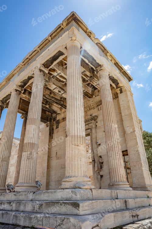 Preview: Athens, Greece. Erechtheion Temple of Athena on Acropolis hill, blue sky background