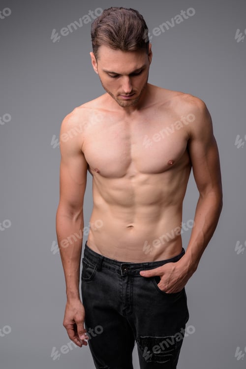 Preview: Studio shot of handsome muscular man shirtless