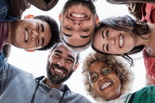 Preview: Group of diverse friends hugging in circle - Multiracial people team having fun