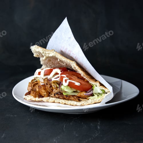 Preview: Delicious Berliner doner kebab with fresh turkey and chicken, mixed salad with tomatoes