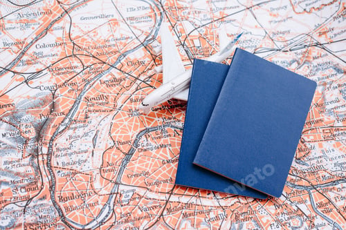 Preview: Passports and model airplane on a world map background