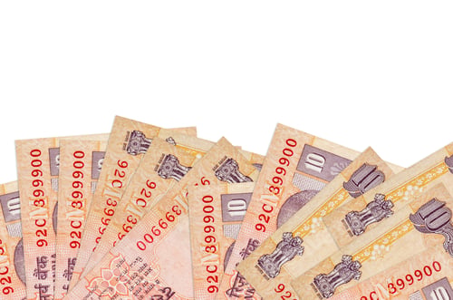 Preview: 10 Indian rupees bills lies on bottom side of screen isolated on white background