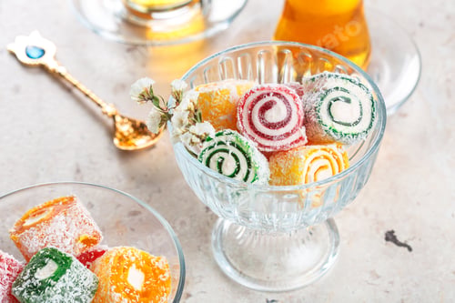 Preview: various pieces of turkish delight lokum and black tea