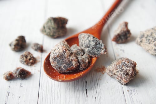 Preview: Himalayan black salt rock crystals, Kala Namak in a container on table