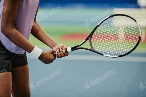 Preview: Tennis Player Holding Racket Closeup