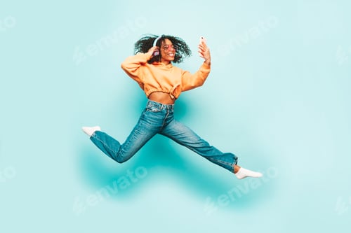 Preview: Young beautiful woman posing in studio