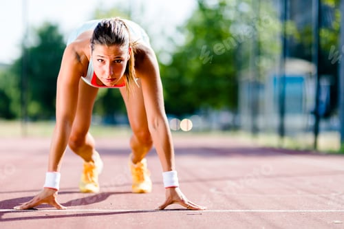 Preview: Female sprinter getting ready for the run