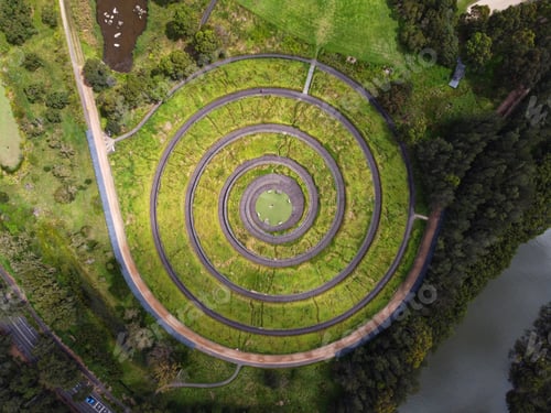 Preview: Aerial shot of a Spiral Hilltop green Olympic park