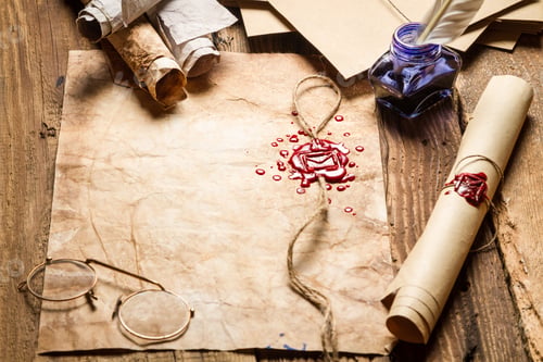 Preview: Old scrolls with red sealant, glasses and blue ink in the inkwell
