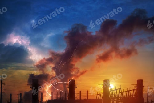 Preview: Hemical factory plant and oil refinery industry with sunrise. Dramatic sky and lightning