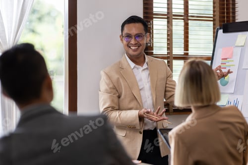 Preview: Group of confident business people point to graphs and charts to analyze market data, balance sheet,