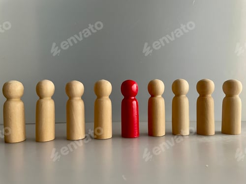 Preview: Close-up shot of wooden figures on a grey background