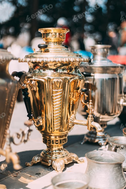 Preview: Shiny Bright Traditional Russian Samovar At Flea Market. Tea Party Concept And Hospitality. Vintage