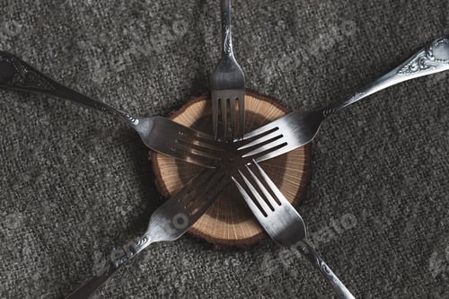Preview: set of silver forks on the table