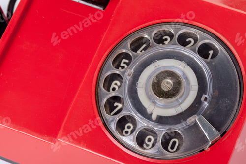 Preview: Red old telephone on white background