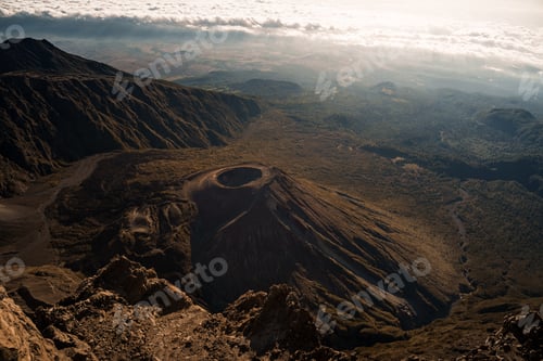 Preview: Sunlight illuminating the volcanic crater of mount meru in tanzania, africa