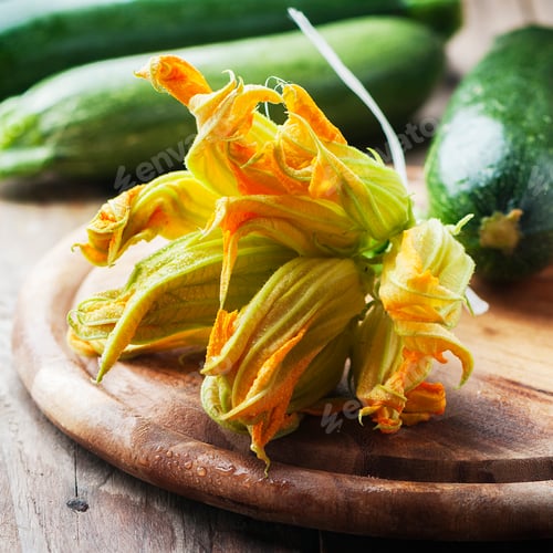Preview: Raw courgette flower on the wooden table