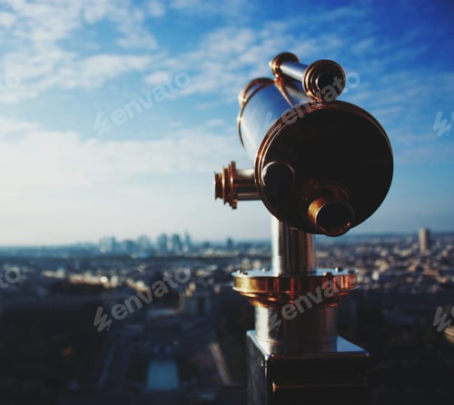 Preview: Telescope Overlooking Urban Cityscape on Sunny Day