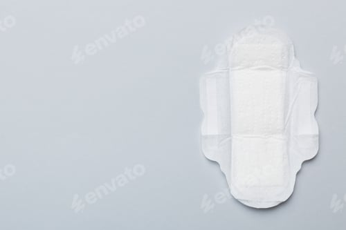 Preview: Women hygiene products or sanitary pad on colored background. Pastel color. Closeup