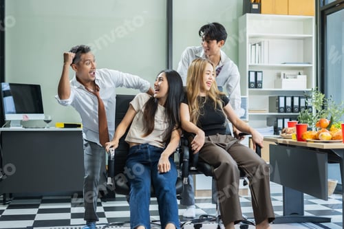 Preview: Celebration successful deal and pizza in the workplace.