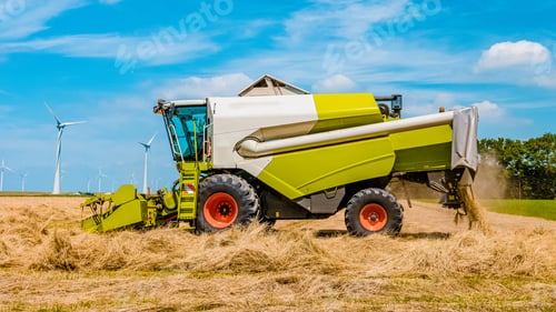 Preview: Tractor on the land, Harvesting machine tractor working in the field. Combine harvester machine
