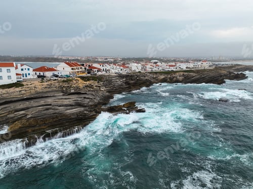 Preview: Oceanfront buildings and crashing waves in Baleal