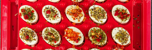 Preview: cheese appetizer soft cheese with herbs and tomatoes pieces fresh tasty food dish delicious gourmet