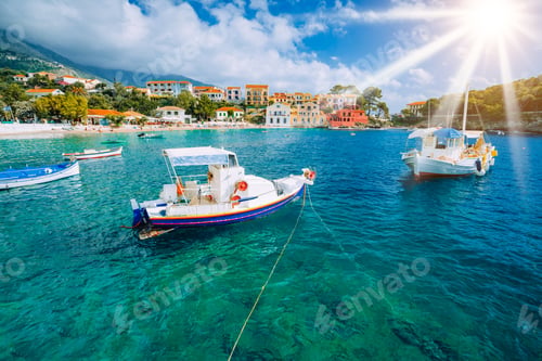 Preview: Cozy Assos village in Kefalonia. Colorful boats in azure bay under morning sunlight. Sommer vacation