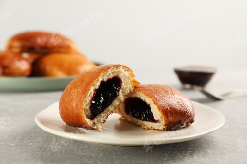 Preview: Delicious baked patty with jam on light grey table