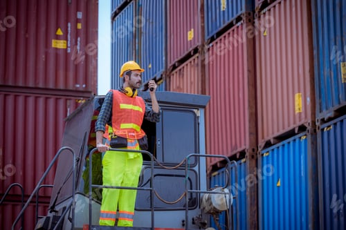 Preview: Dock worker under inspection and checking about dock container shipping warehouse. he wearing safety