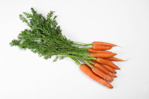 Preview: Ripe carrots on white background. Healthy diet