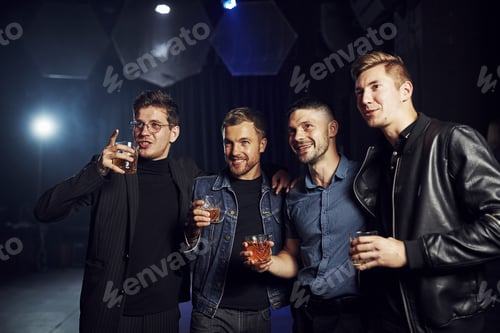 Preview: Conception of nightlife. People have fun in the club. With alcohol in hands