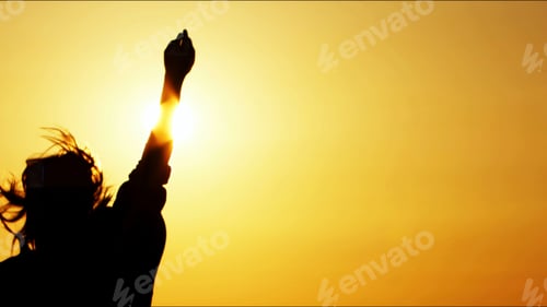 Preview: Young Woman Silhouette in Sunset