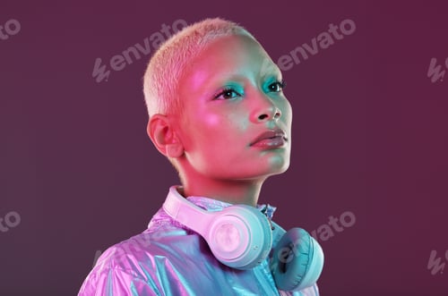 Aperçu: Cyberpunk fashion, black woman and headphones in studio, holographic clothes and vaporwave style. F