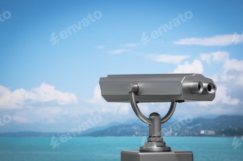 Preview: Metal tower viewer installed near sea, space for text. Mounted binoculars