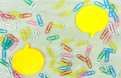 Preview: Sticky notes and paperclips with copy space flat lay