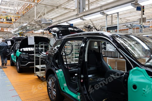 Preview: Car bodies are on assembly line. Factory for production of cars. Modern automotive industry. A car