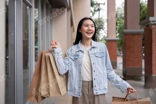 Preview: Smiling Shopper Enjoying Black Friday Deals with Shopping Bags Outdoors