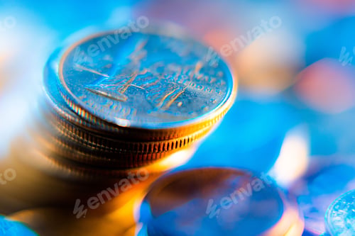 Preview: Nickels dimes and quarters with a shallow depth of field and selective focus about to collapse