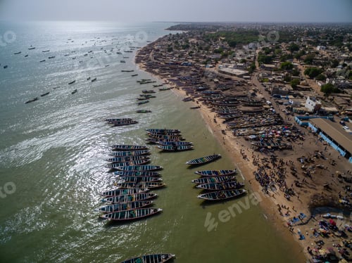 Preview: High angle shot of the fishing boats by the beach captured in Senegal, Africa