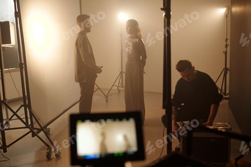 Preview: Actress Listening to Director Backstage